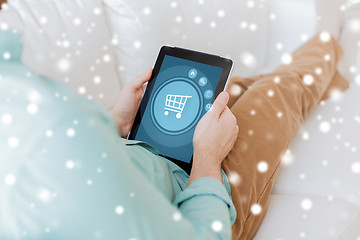 Image showing close up of man with tablet pc computer at home