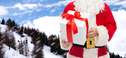 Image showing man in costume of santa claus with gift box