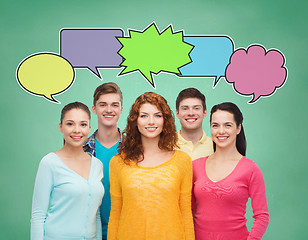 Image showing group of smiling teenagers with text bubbles