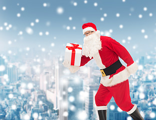 Image showing man in costume of santa claus with gift box