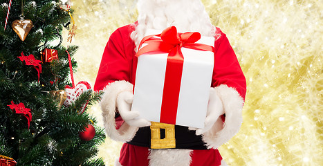 Image showing man in costume of santa claus with gift box