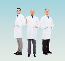 Image showing smiling male doctors in white coats