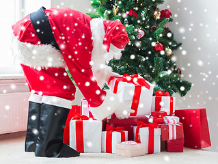 Image showing man in costume of santa claus with presents