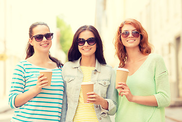 Image showing smiling teenage girls with on street