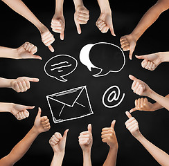 Image showing hands showing thumbs up  with over e-mail symbols