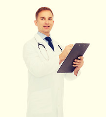 Image showing smiling male doctor with clipboard and stethoscope