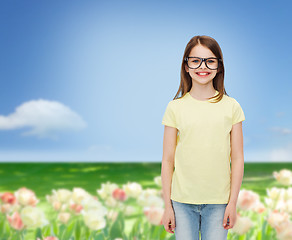 Image showing smiling cute little girl in black eyeglasses