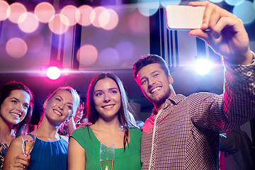 Image showing friends with glasses and smartphone in club