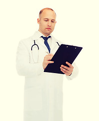 Image showing serious male doctor with clipboard and stethoscope