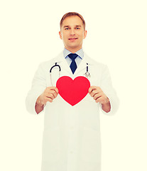 Image showing smiling male doctor with red heart