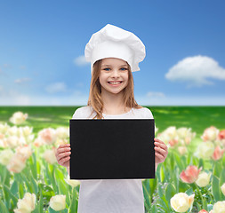 Image showing little cook or baker with blank black paper