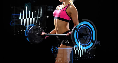 Image showing sporty woman exercising with barbell