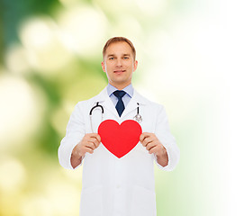 Image showing smiling male doctor with red heart and stethoscope