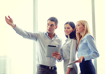 Image showing business team working with tablet pcs in office