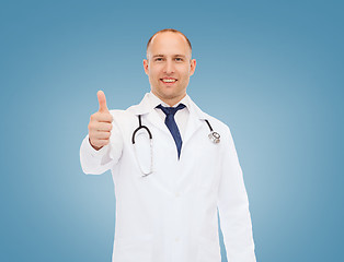 Image showing smiling doctor with stethoscope showing thumbs up