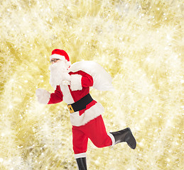 Image showing man in costume of santa claus with bag