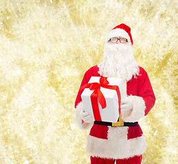 Image showing man in costume of santa claus with gift box