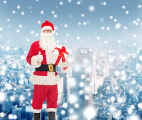 Image showing man in costume of santa claus with gift box