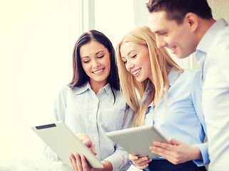 Image showing business team working with tablet pcs in office