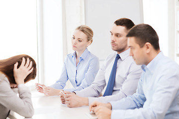 Image showing businesswoman getting fired in office