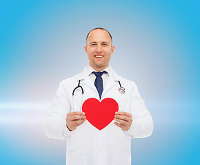 Image showing smiling male doctor with red heart and stethoscope