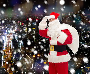 Image showing man in costume of santa claus with bag