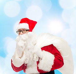 Image showing man in costume of santa claus with bag