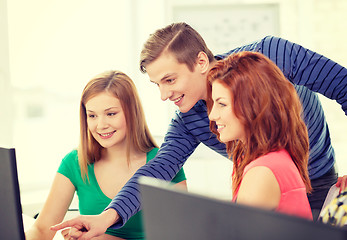 Image showing group of smiling students having discussion