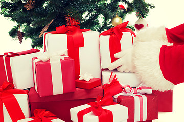 Image showing close up of santa claus with presents