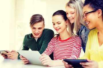 Image showing smiling students with tablet pc at school