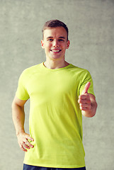 Image showing smiling man in gym