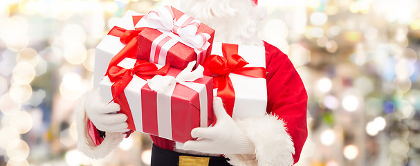 Image showing close up of santa claus with gift box