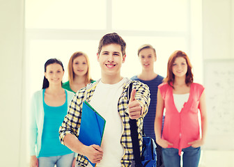 Image showing male student with classmates showing thumbs up