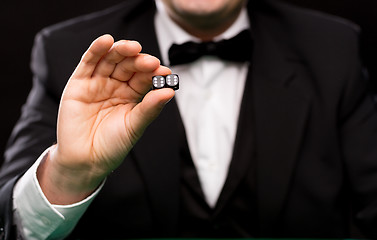 Image showing close up of man showing dice with double six
