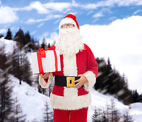 Image showing man in costume of santa claus with gift box