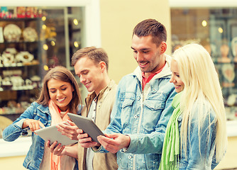 Image showing group of smiling friends with tablet pc computers