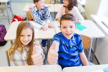 Image showing group of school kids showing thumbs up