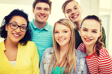 Image showing group of smiling people at school or home