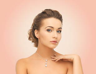 Image showing beautiful woman wearing shiny diamond pendant