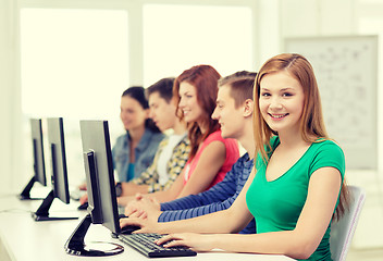 Image showing female student with classmates in computer class