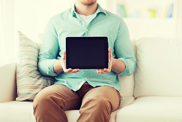 Image showing close up of man with tablet pc computer at home