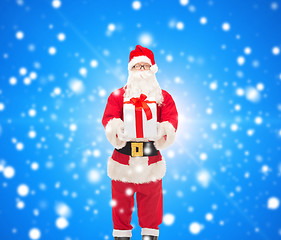 Image showing man in costume of santa claus with gift box