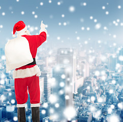 Image showing man in costume of santa claus with bag