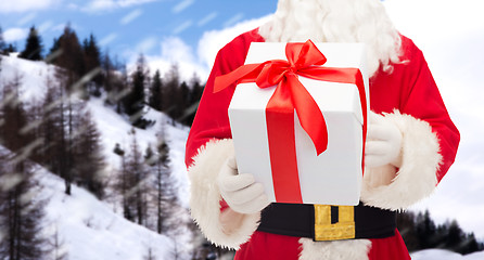 Image showing man in costume of santa claus with gift box