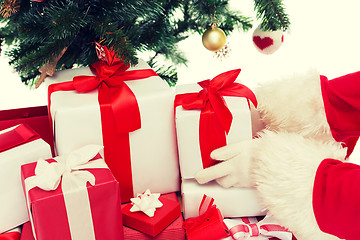 Image showing close up of santa claus with presents