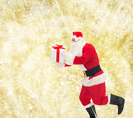 Image showing man in costume of santa claus with gift box