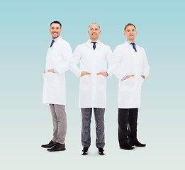 Image showing smiling male doctors in white coats