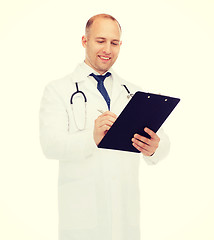 Image showing smiling male doctor with clipboard and stethoscope