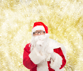 Image showing man in costume of santa claus with bag