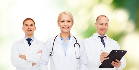 Image showing group of doctors with stethoscopes and clipboard